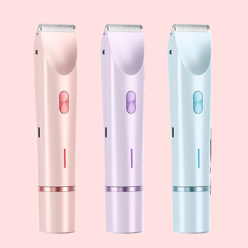 Three hair trimmers in pink, purple, and white on a white background